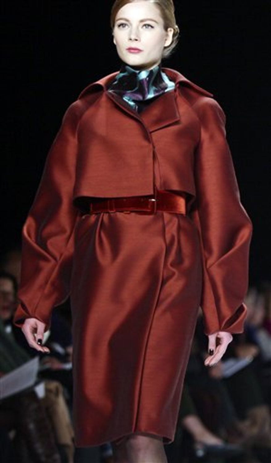 Fashion from the Fall 2011 collection of Carolina Herrera is modeled on Monday, Feb. 14, 2011 in New York. (AP Photo/Bebeto Matthews)
