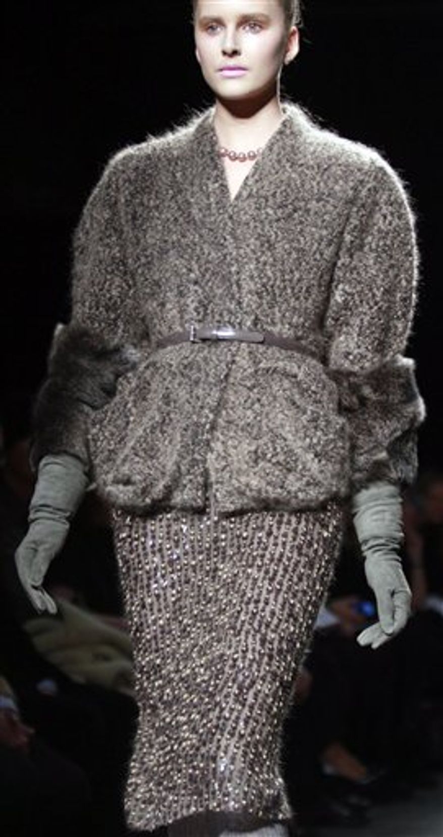 Fashion from the fall 2011 collection of Donna Karan is modeled on Monday, Feb. 14, 2011 in New York. (AP Photo/Bebeto Matthews)