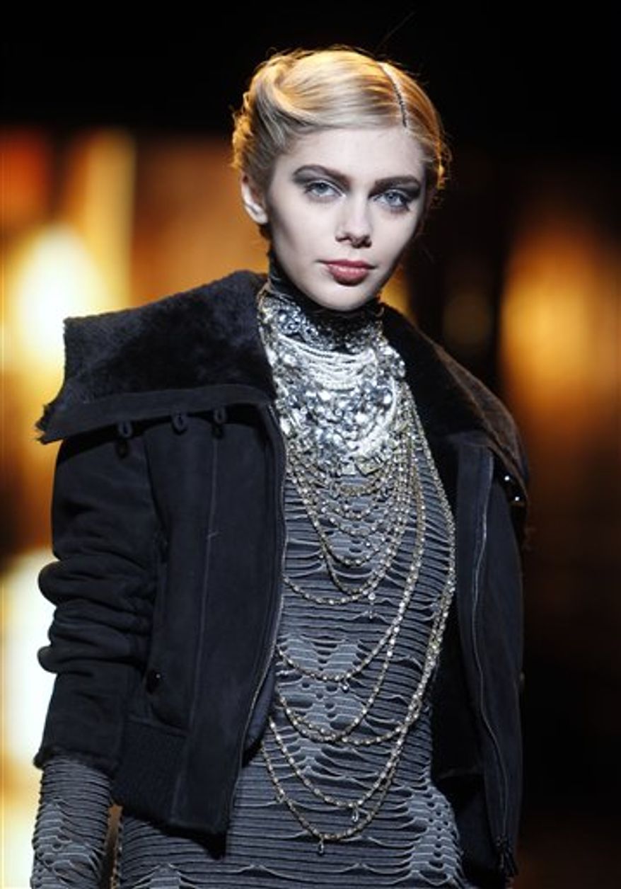 The Badgley Mischka fall 2011 collection is modeled during Fashion Week Tuesday, Feb. 15, 2011 in New York. (AP Photo/Jason DeCrow)