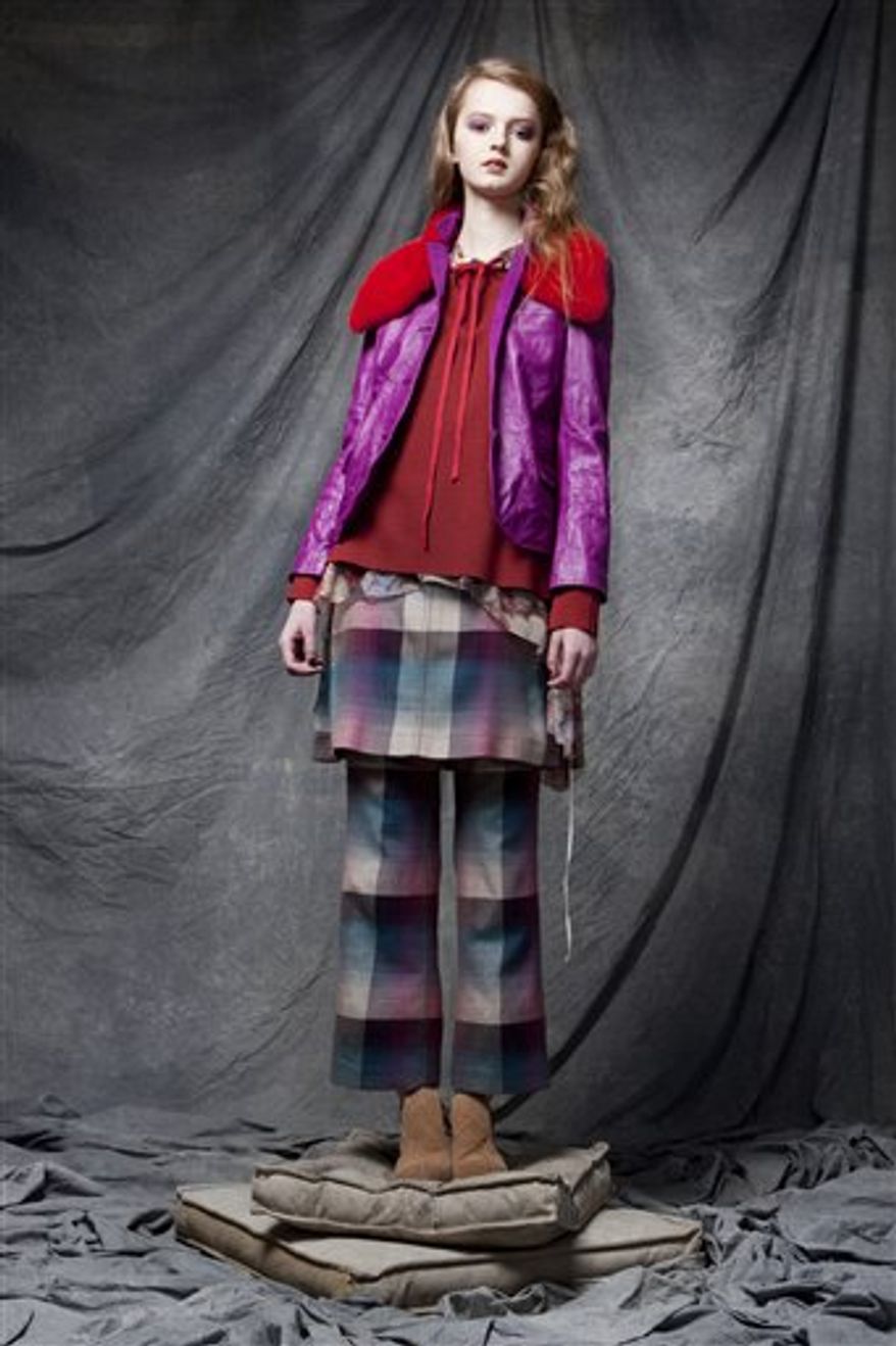 This Monday, Feb. 14, 2011 photo courtesy of Chris Benz shows the Chris Benz Fall 2011 collection modeled during Fashion Week in New York. (AP Photo/Chris Benz) NO SALES