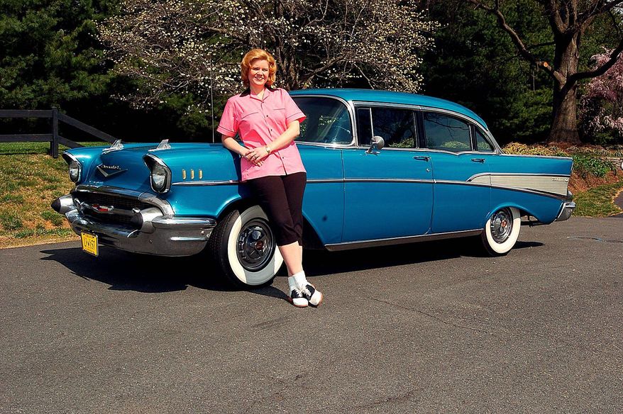 Theresa Werner has purchased a wardrobe to harmonize with her four-door 1957 Chevrolet Bel Air. (Bill O'Brien/The Washington Times)