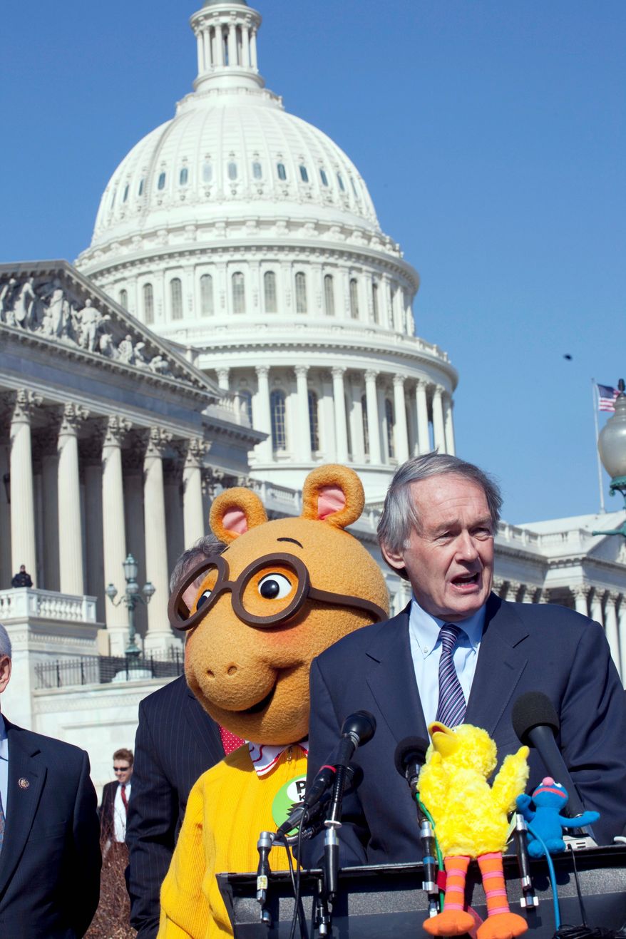Rep. Edward J. Markey, Massachusetts Democrat, flanked by Arthur from the popular PBS children's show, is defending public programming against Republican funding cuts. (Associated Press)