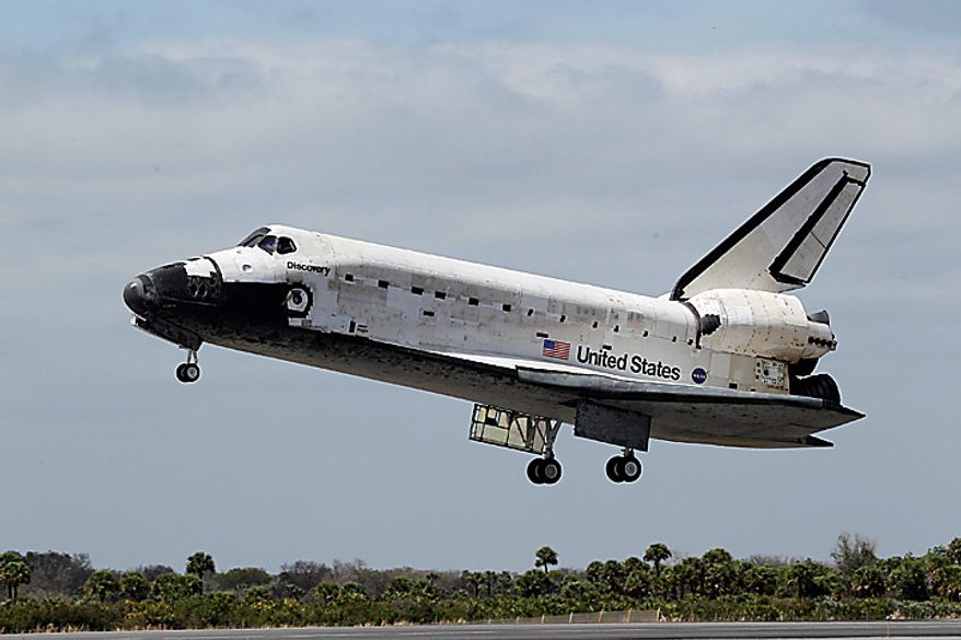 Space shuttle Discovery lands at the Kennedy Space Center at Cape Canaveral, Fla., on Wednesday, March 9, 2011. (AP Photo/John Raoux)