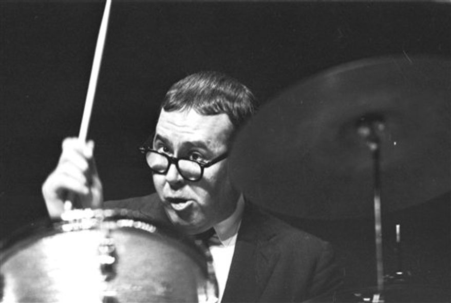 FILE - In this August 1977 file photo, Joe Morello plays on a drum in his home in Irvington, N.J. Morello, one of the most famous drummers in jazz music history, died Saturday, March 12, 2011 at his home in New Jersey. He was 82. (AP Photo/File)