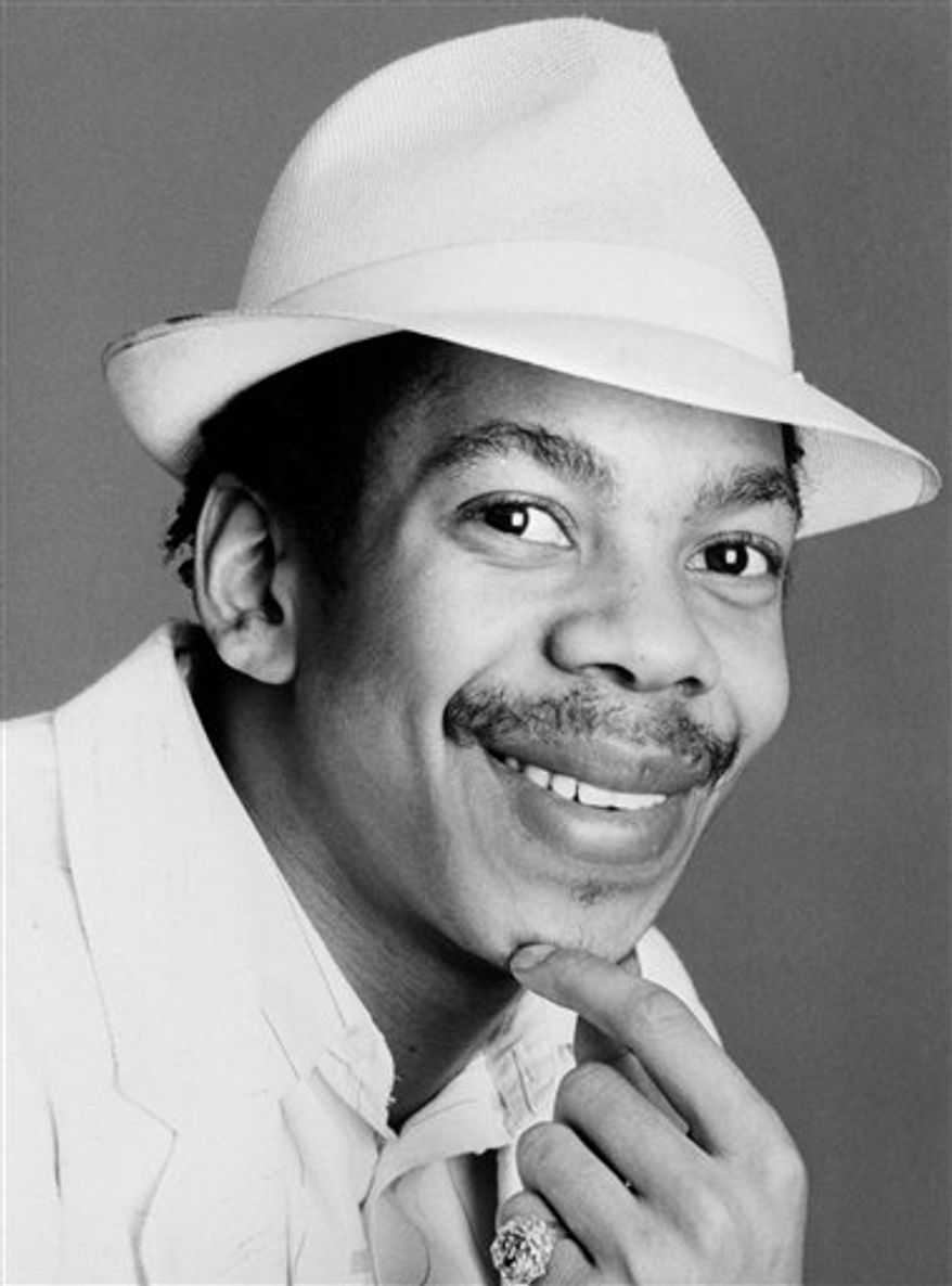 File - Photo dated April 27 1987 of reggae star Smiley Culture. British media are reporting Tuesday March 15 2011, reggae star Smiley Culture has died during a police drugs raid on his home. The London-born musician _ whose real name is David Emmanuel _ reportedly died from self-inflicted wounds Tuesday when police officers swooped on his home in east Surrey, according to Britain's Press Association. The reggae singer had appeared before magistrates in September last year charged with conspiracy to supply cocaine. He was 48. (AP Photo / file) UNITED KINGDOM OUT - NO SALES - NO ARCHIVE