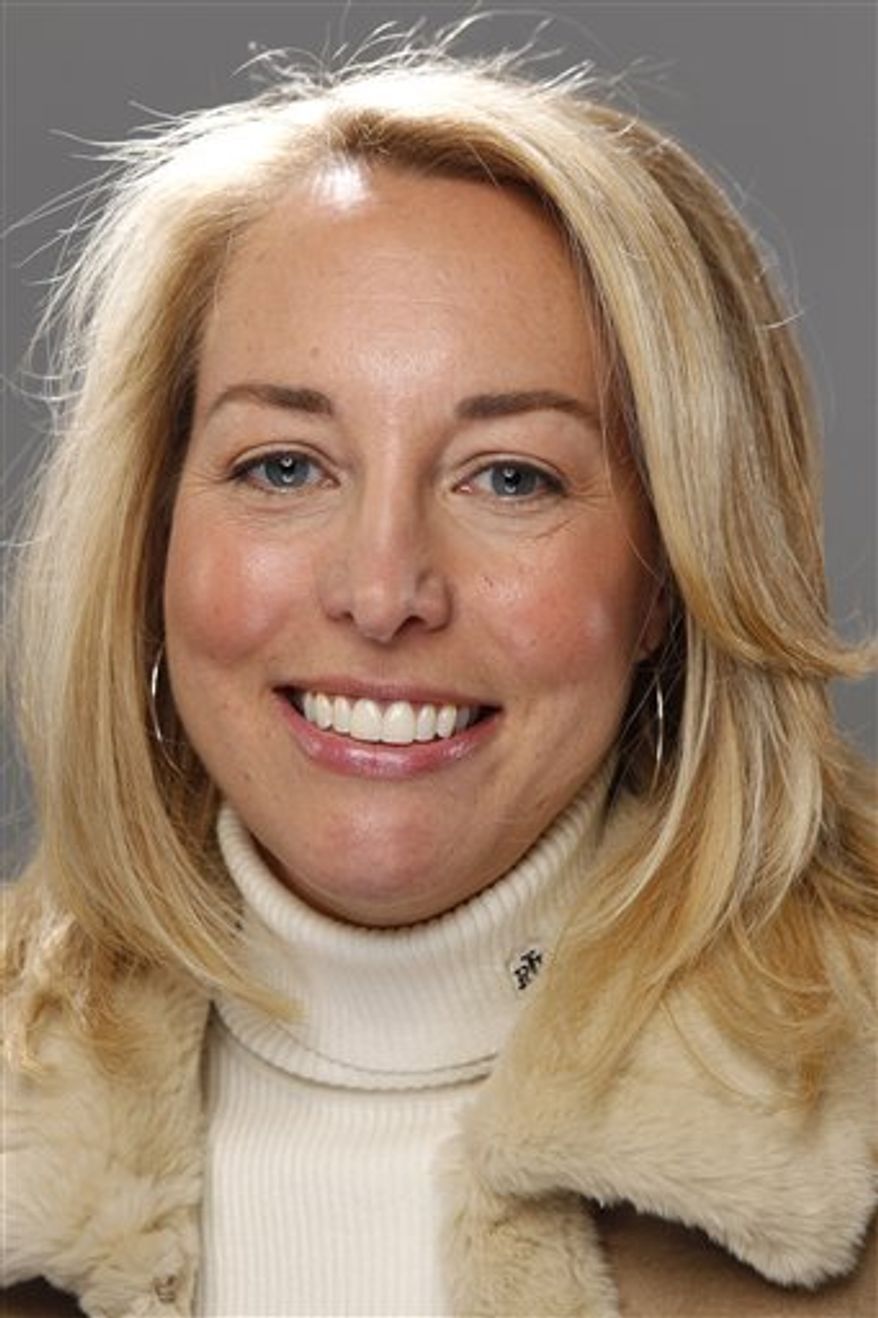FILE - Valerie Plame Wilson of Count Down to Zero poses for a portrait at the Gibson Guitar Lounge during the Sundance Film Festival in Park City, Utah in this January 25, 2010 file photo. The New York Times reports Saturday March 19, 2011 that Wilson has a book deal with Penguin Group USA for a series of international suspense novels. The newspaper says she will team up with mystery writer Sarah Lovett on the books, which will feature a fictional operative. (AP Photo/Carlo Allegri, File)