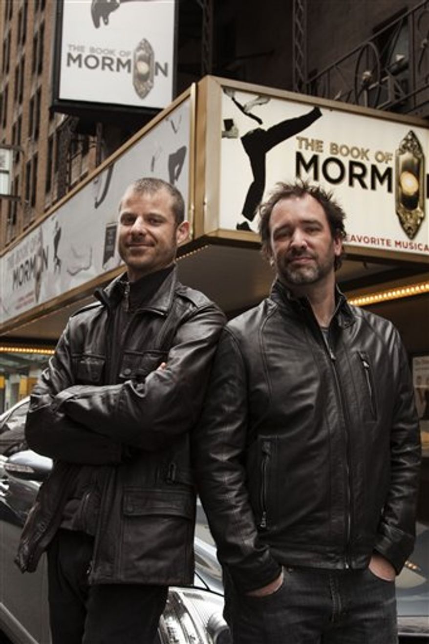 CORRECTS LEFT AND RIGHT In this March 16, 2011 photo, Trey Parker, right, and Matt Stone, co-creators of the Broadway show "The Book of Mormon," pose for a portrait outside the Eugene O'Neill Theatre in New York. (AP photo/Victoria Will)