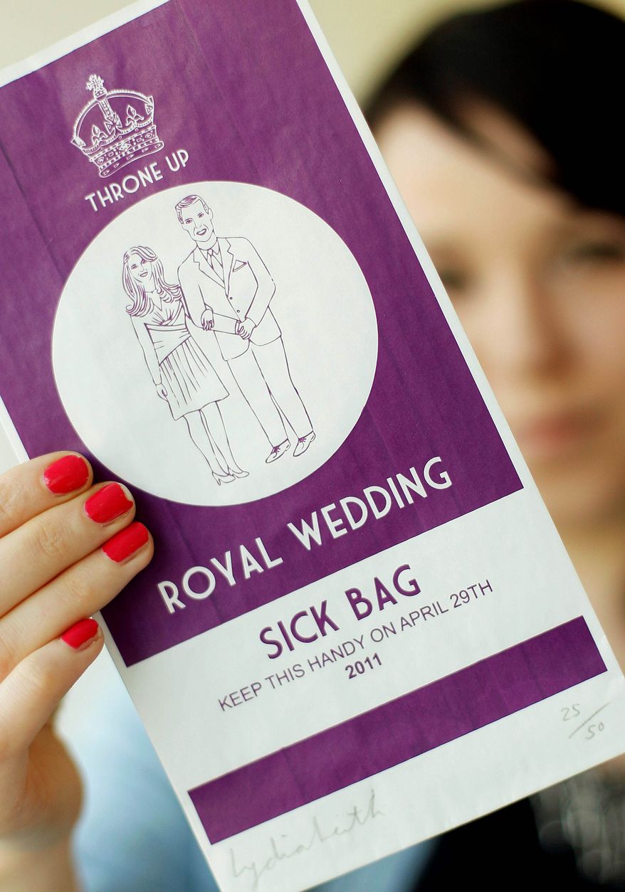 Ellie Phillips holds up a specially commissioned airline-style sick bag for people who have had too much of the royal wedding plans. Prince William and Kate Middleton are getting married in London on April 29. (Associated Press)