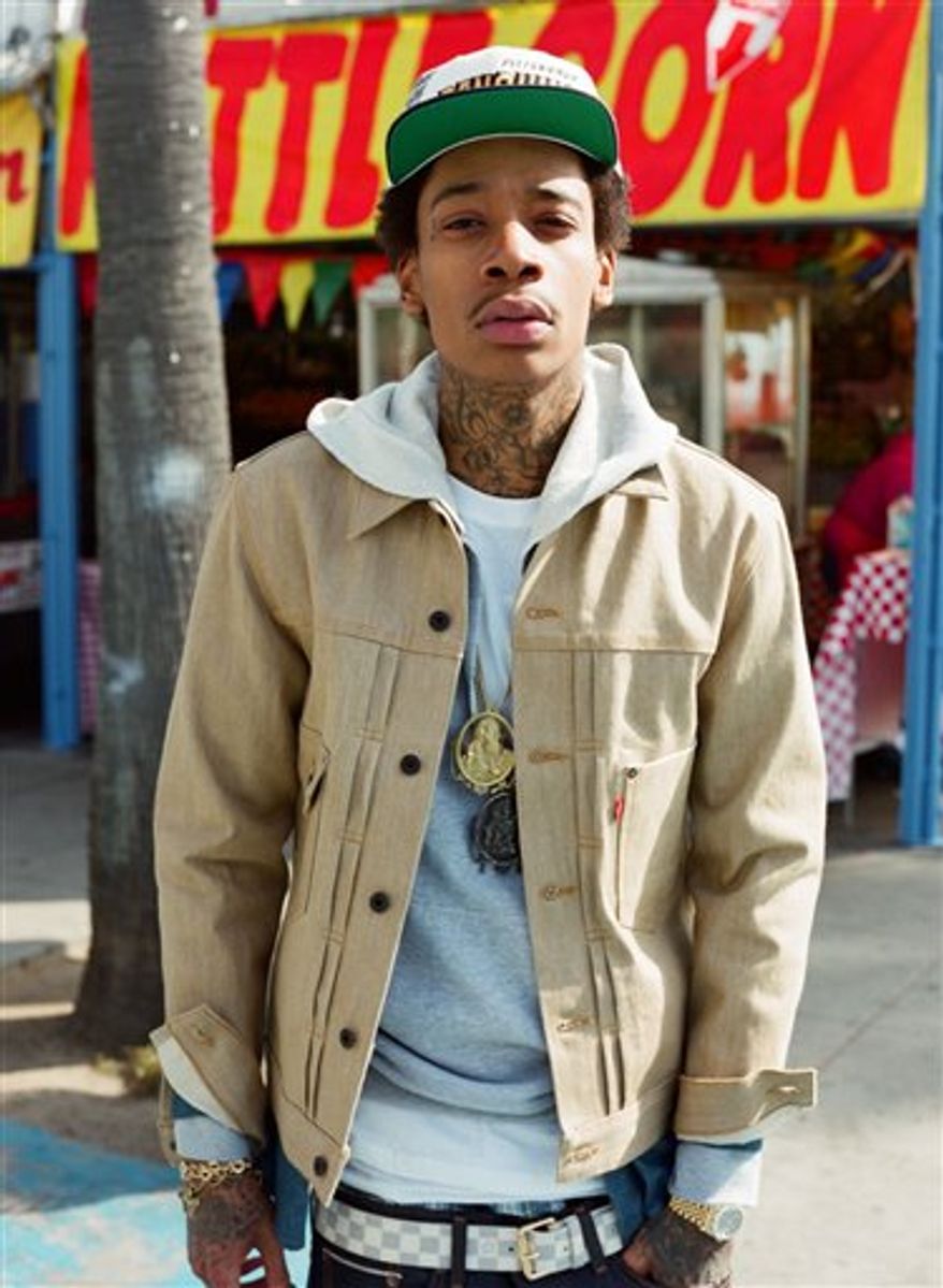 In this undated publicity image released by Atlantic Records, rapper Wiz Khalifa is shown. (AP Photo/Atlantic Records, Darren Ankenman)