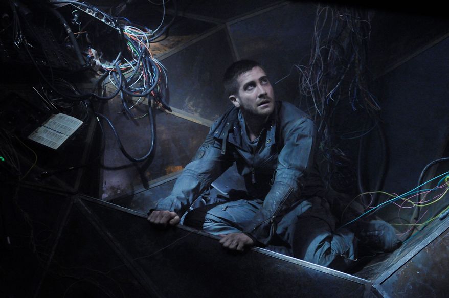 Capt. Colter Stevens (Jake Gyllenhaal) uses the source code to investigate the final eight minutes before a train explosion in a scene from "Source Code." He must discover who planted the bomb before the next attack takes place.