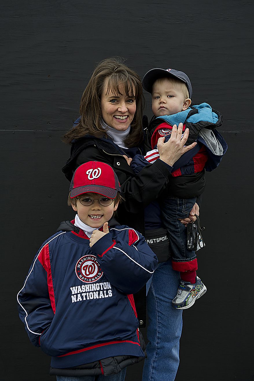Samantha Peele of Ashburn, Va., brought her two sons Ryan, 5 1/2, and Jason, 2, to opening day Thursday, March 31, 2011 at Nationals Park in Washington, D.C. (Barbara L. Salisbury/The Washington Times)