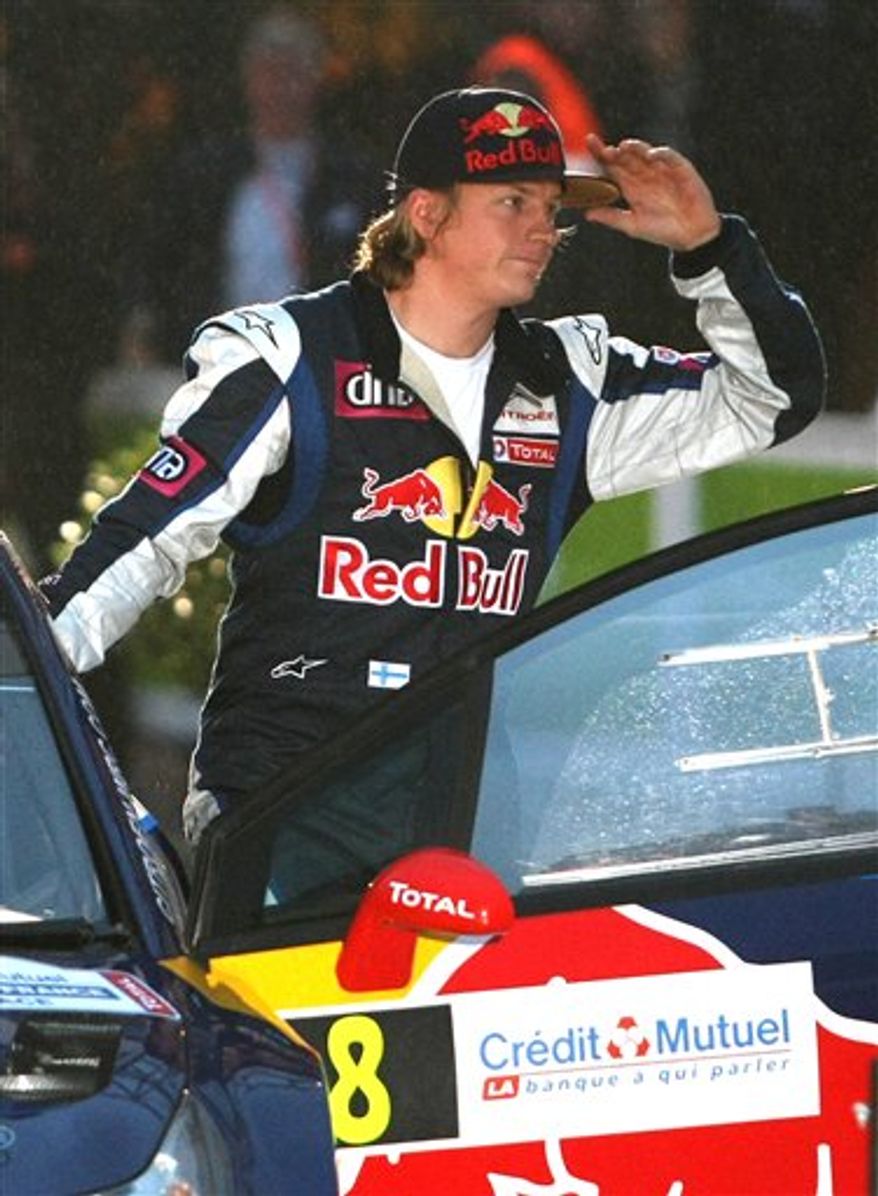 This photo taken Sept. 30, 2010 shows Kimi Raikkonen of Finland during the presentation of Rally de France, in Strasbourg , eastern France, Thursday, Sept. 30, 2010. Raikkonen is reportedly planning to enter a Truck Series race at Charlotte next month. If he does try NASCAR, he'd follow Juan Pablo Montoya, Scott Speed and Nelson Piquet Jr. as the most recent former F1 drivers to move to America's most popular motorsports series. (AP Photo/Lionel Cironneau)