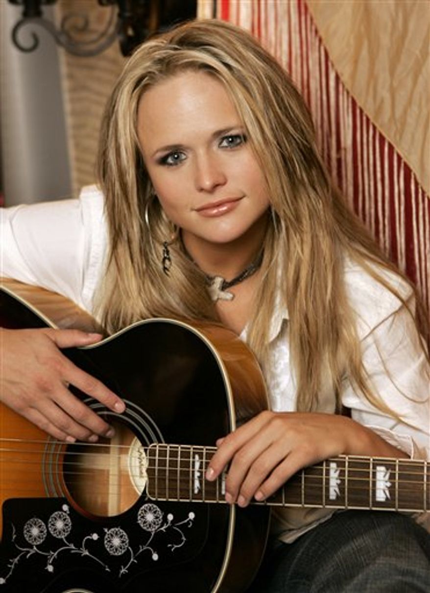 FILE - In this March 21, 2007 file photo, Miranda Lambert is shown on her tour bus in Nashville, Tenn., (AP Photo/Mark Humphrey, File)