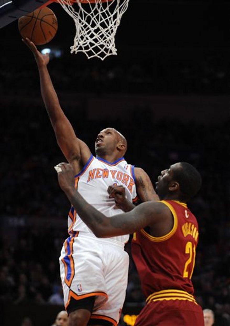 New York Knicks' Chauncey Billups shoots over Cleveland Cavaliers' J.J. Hickson during the first half of NBA basketball game, Sunday, April 3, 2011, at Madison Square Garden in New York. (AP Photo/Stephen Chernin)