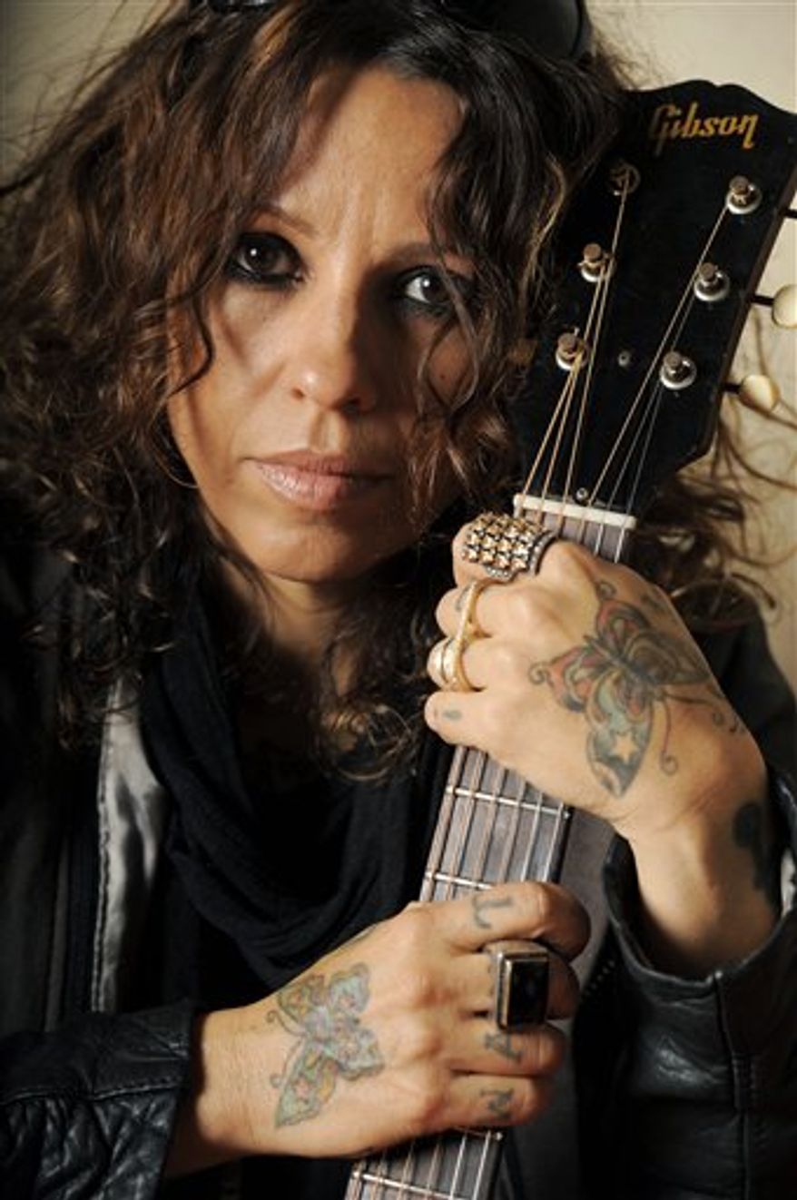 In this March 8, 2011 file photo, songwriter Linda Perry poses for a portrait in Los Angeles. (AP Photo/Chris Pizzello)