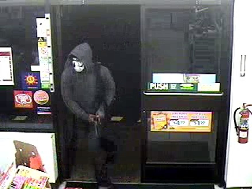 A surveillance photo shows a person Prince George's County police are seeking in connection with a homicide early Thursday at a Fort Washington convenience store.