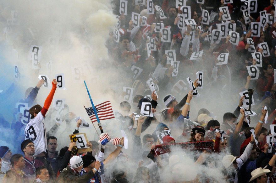 Charlie Davies was honored by fans at RFK Stadium during a World Cup qualifier against Costa Rica the day after the crash. His No. 9 was held aloft at the ninth minute. (The Washington Times)