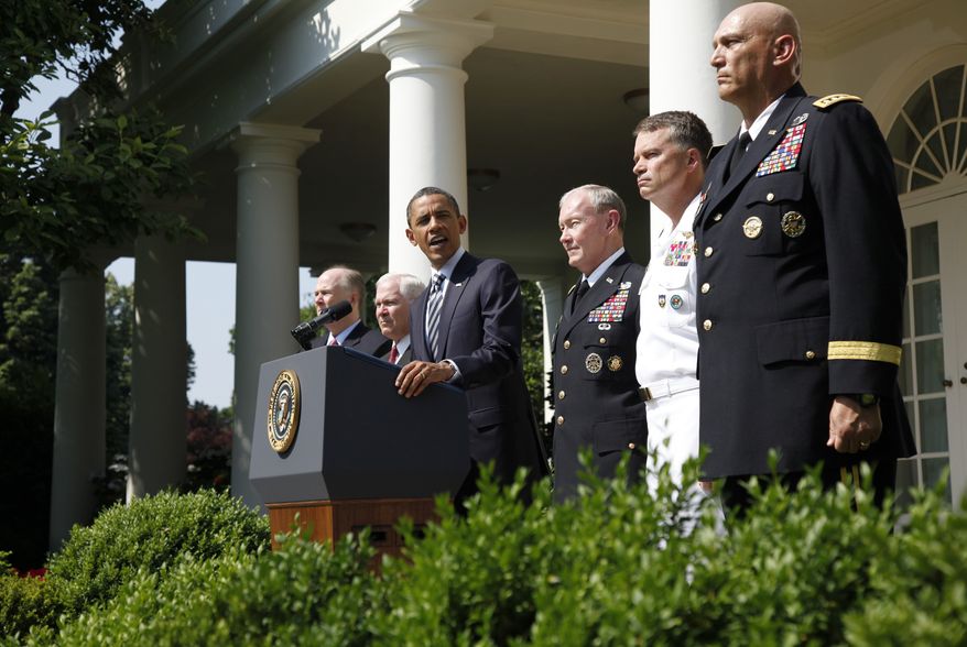 President Obama introduces (from third from right) Army Gen. Martin E. Dempsey, the next chairman of the Joint Chiefs of Staff; Adm. James A. Winnefeld, the new vice chairman of the Joint Chiefs; and Gen. Ray Odierno, the next Army chief of staff, during a Rose Garden ceremony at the White House in Washington on Monday, May 30, 2011. Also pictured are (from left) National Security Adviser Tom Donilon and Defense Secretary Robert M. Gates. (AP Photo/Charles Dharapak)
