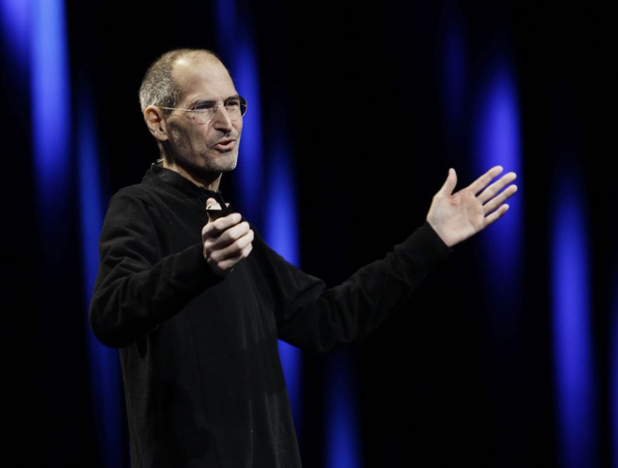 Apple CEO Steve Jobs gestures to his audience during a keynote address to the Apple Worldwide Developers Conference in San Francisco on June 6, 2011. (Associated Press)