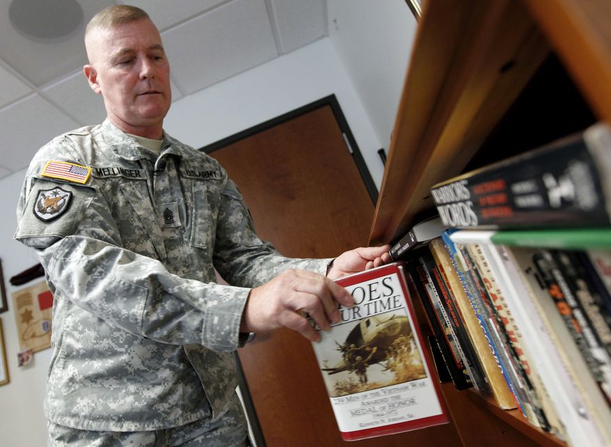 Army Command Sgt. Maj. Jeff Mellinger, 58, is believed to be the last conscripted soldier to have served continuously without a break. He is set to retire this summer. (AP Photo/Alex Brandon)