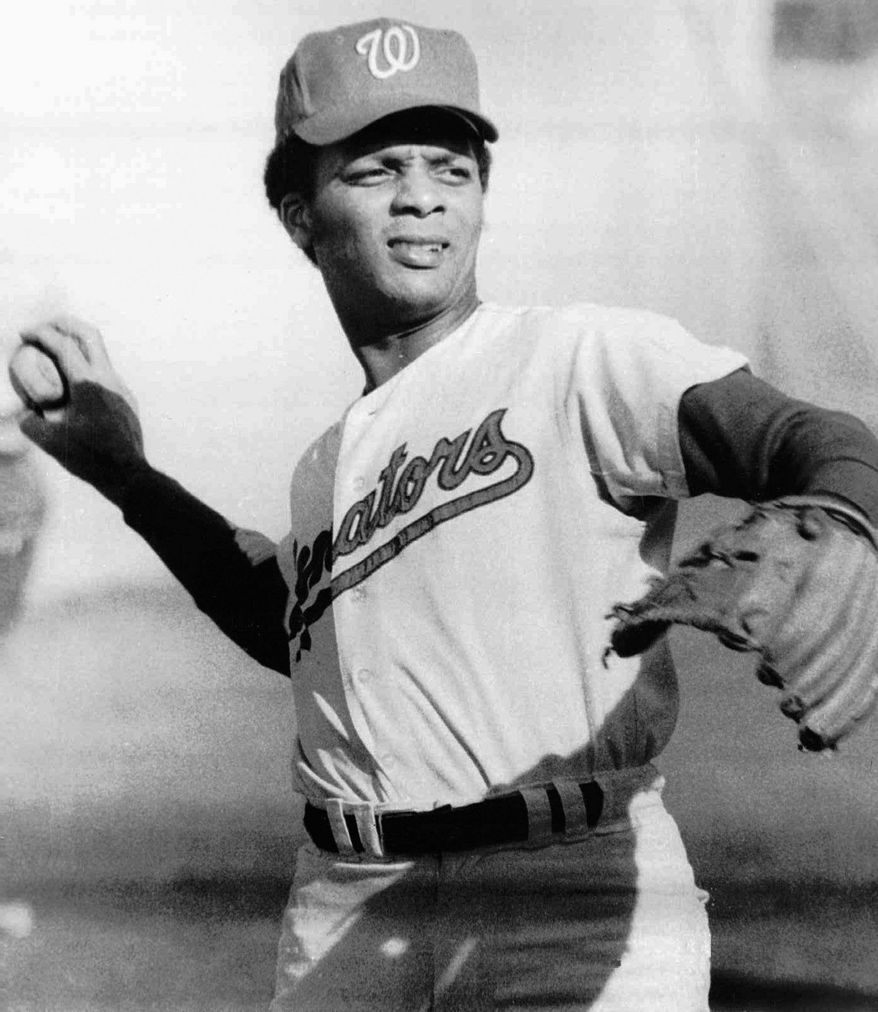 Curt Flood made three All-Star appearances the 1960s. He played 13 games for the Washington Senators in 1971 before retiring. (Associated Press)