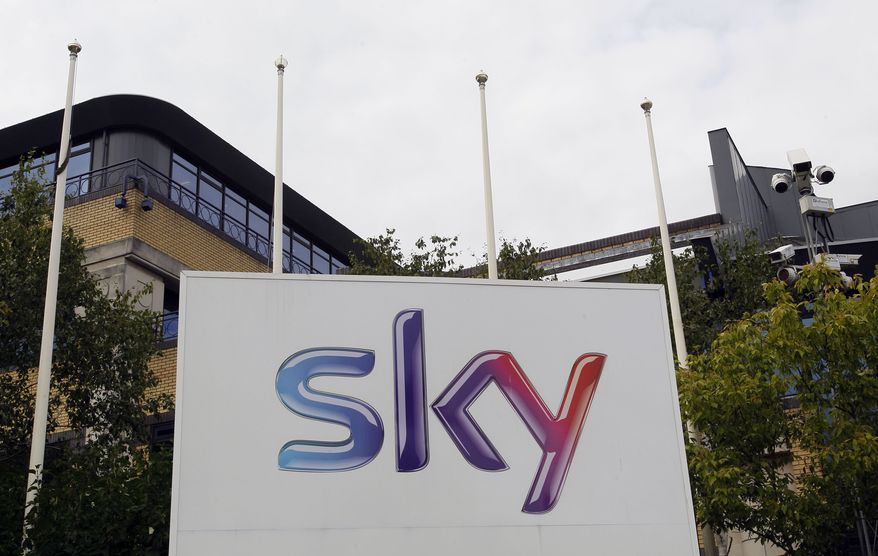 A Sky sign at the BSkyB offices in Isleworth in London is seen on July 13, 2011. (Associated Press)