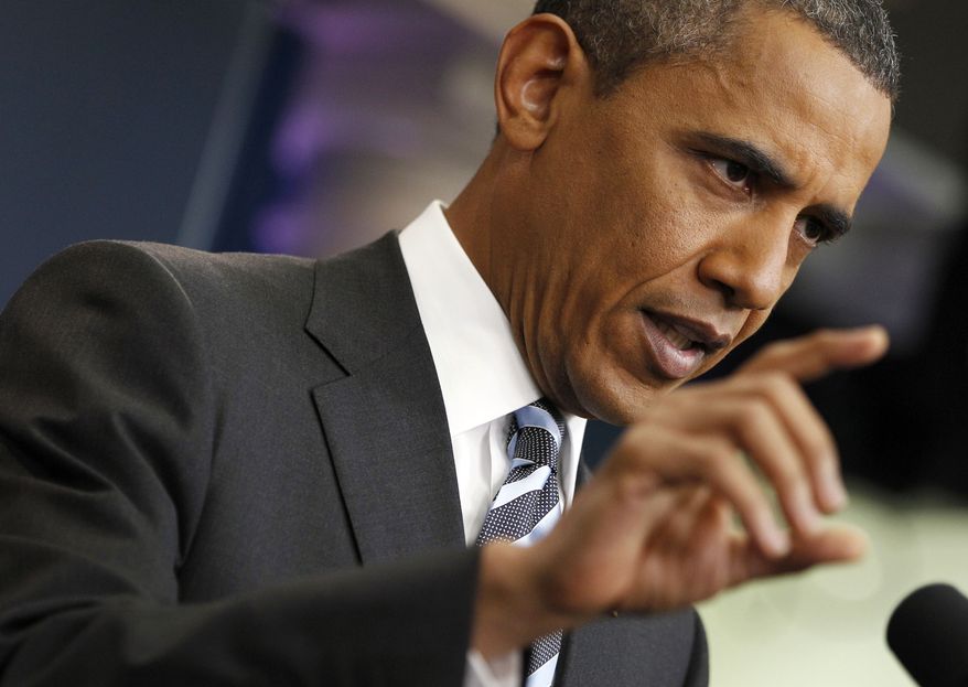 President Obama answers questions on the ongoing budget negotiations during a press conference at the White House on July 15, 2011. (Associated Press)