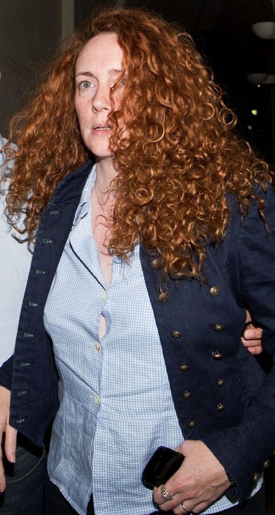 Rebekah Brooks, former British CEO of News Corp., was arrested in London and is being questioned about suspected phone hacking and corruption activities. (Associated Press)