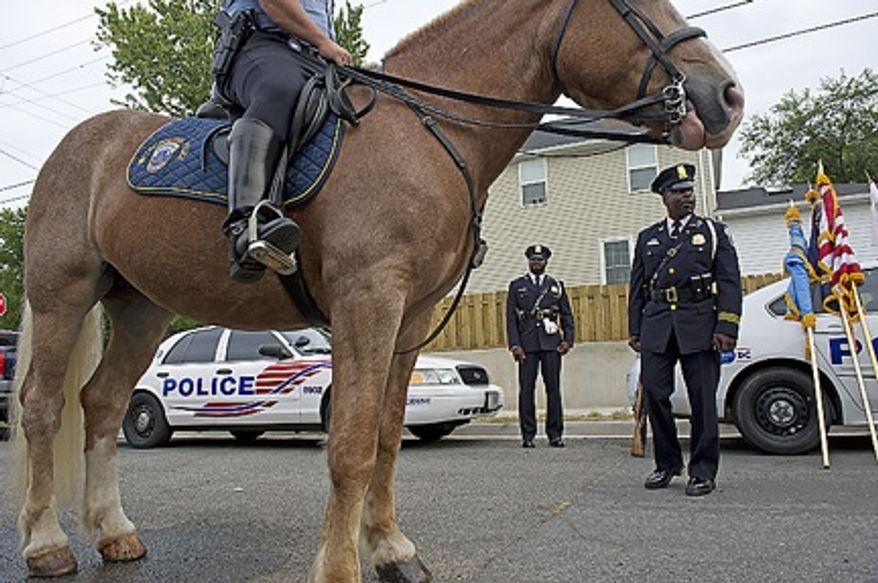 Police have made efforts to increase their presence in the Deanwood neighborhood in Northeast D.C., but some residents say it's not enough. (The Washington Times/File)