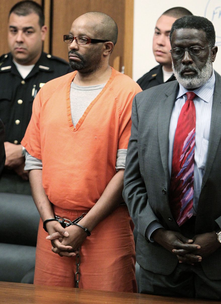 Associated Press
Convicted serial killer Anthony Sowell stands Wednesday with his attorney, Rufus Sims, in court in Cleveland as a jury recommends the death penalty for his crimes.