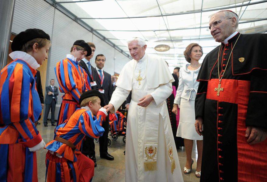 In this picture released by Vatican newspaper Osservatore Romano, Pope Benedict XVI is welcomed by Spanish children dressed as Swiss Guards upon his arrival at Madrid's Barajas airport Thursday, Aug. 18, 2011. Behind the Pontiff is Spain's Queen Sofia and at right is Madrid's archbishop Cardinal Antonio Maria Rouco Varela. The Pontiff is paying a four-day visit to greet up to a million or more young pilgrims from around the planet on the occasion of the Catholic Church's World Youth Day. (AP Photo/Osservatore Romano)