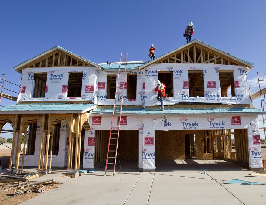 Builders frame a new home on Monday, Aug. 22, 2011, in Queen Creek, Ariz. New-home sales this year are on track to finish as the worst on records dating back a half-century. (AP Photo/Matt York)