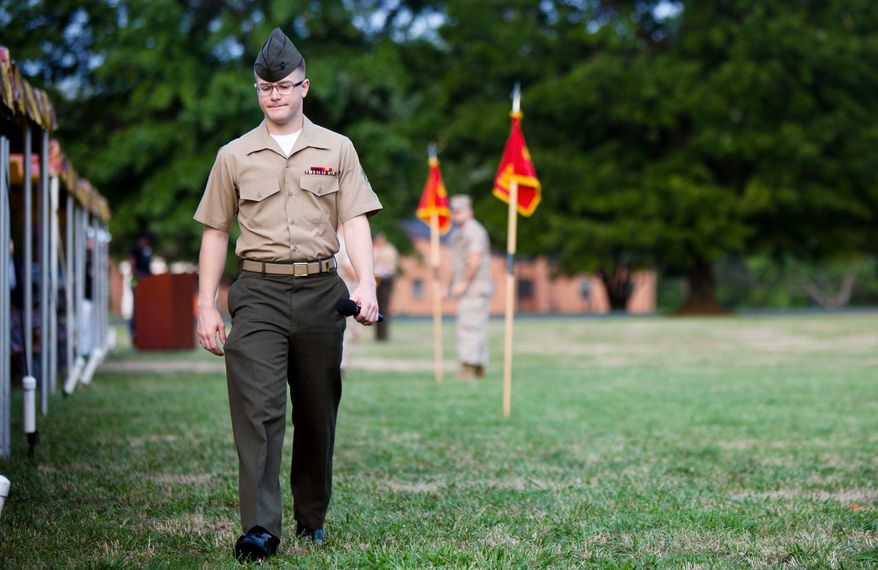 By day, rap artist Derek Meitzer, aka D'Meitz, is Lance Cpl. Meitzer, currently stationed at Marine Corps Base Quantico in Virginia. (Pratik Shah/The Washington Times)