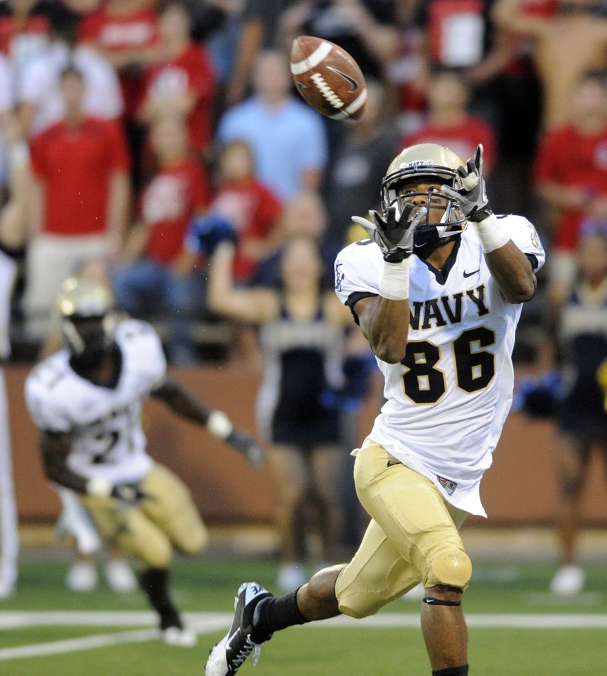Navy's Brandon Turner hauls in a touchdown pass against Western Kentucky on Saturday, Sept. 10, 2011, in Bowling Green, Ky. (AP Photo/Daily News, Joe Imel)