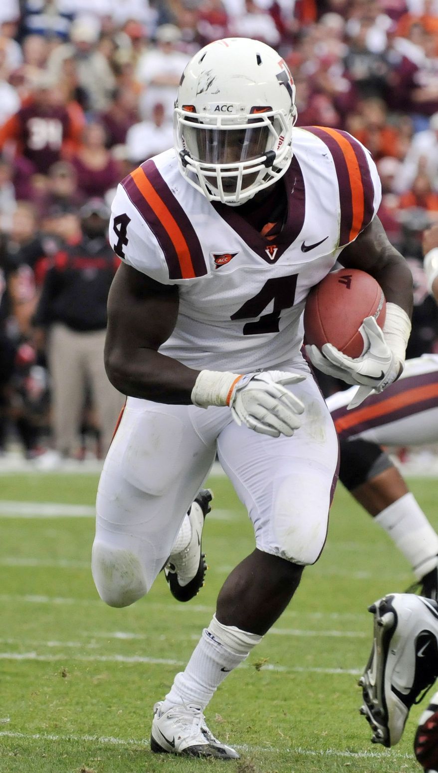 ASSOCIATED PRESS
Virginia Tech's David Wilson rushed for just 85 yards against Arkansas State on Saturday, but quarterback Logan Thomas was free to pass for 292.
