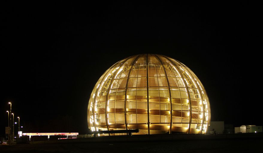 ** FILE ** In this Tuesday, March 30, 2010, file photo, the globe of the European Organization for Nuclear Research, CERN, is illuminated outside Geneva, Switzerland. Scientists at CERN, the world's largest physics lab, say they have clocked subatomic particles, called neutrinos, traveling faster than light, a feat that, if true, would break a fundamental pillar of science, the idea that nothing is supposed to move faster than light, at least according to Albert Einstein's special theory of relativity. (AP Photo/Anja Niedringhaus)