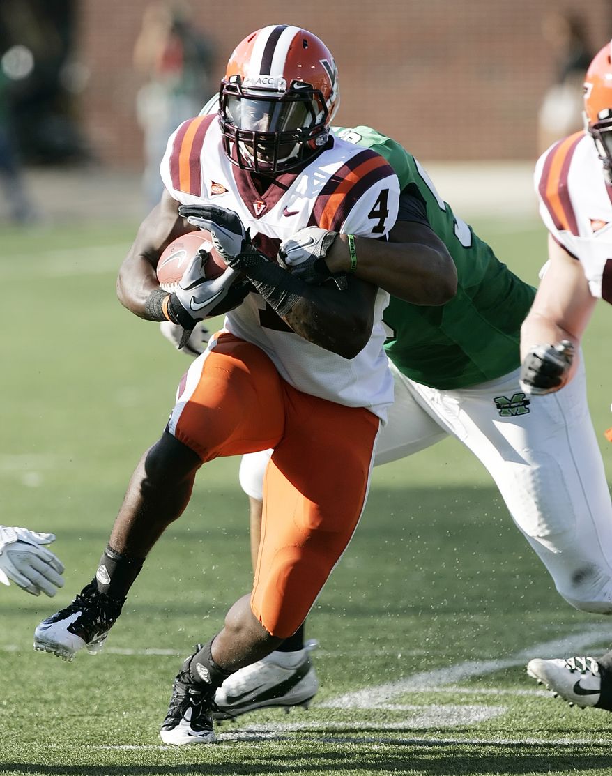 Virginia Tech running back David Wilson rushed for 132 yards and a touchdown in Tech's 30-10 win against Marshall on Saturday in Huntington, W.Va. (AP Photo/Randy Snyder)