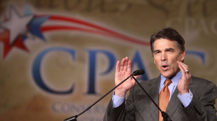 Texas Gov. Rick Perry addresses the Conservative Political Action Conference at the Orange County Convention Center in Orlando, Fla., on Friday. (Associated Press)