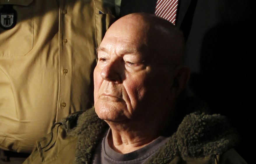 ** FILE ** John Demjanjuk waits in a Munich courtroom on Thursday, May 12, 2011. (AP Photo/Matthias Schrader)