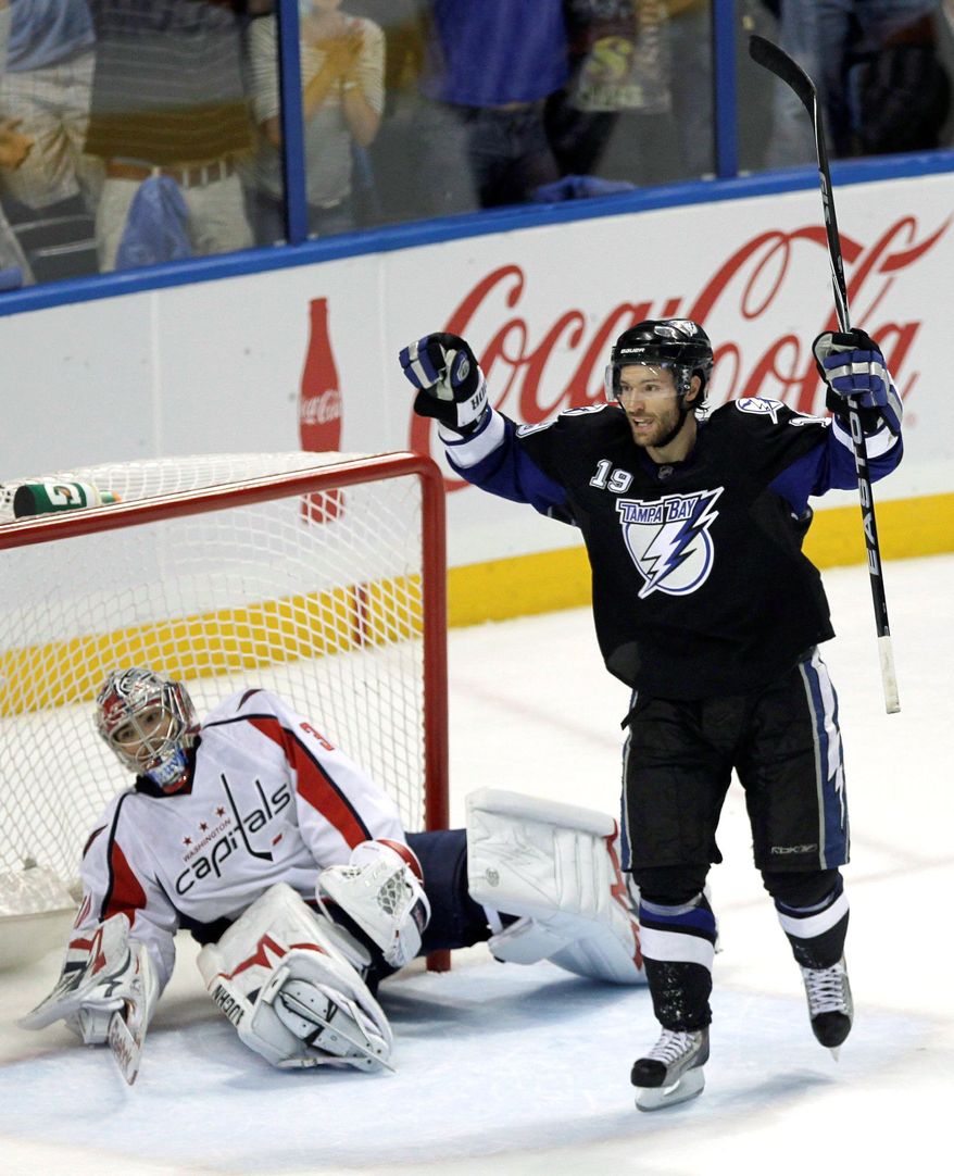 Michal Neuvirth and the Capitals were swept by the Tampa Bay Lightning in last season's playoffs. Washington's latest postseason disappointment prompted the team to sign a new No. 1 goaltender in veteran Tomas Vokoun. (Associated Press)