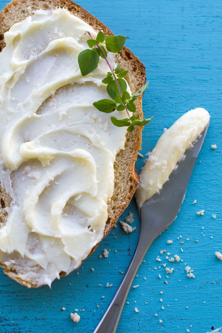 ** FILE ** For the best homemade butter, buy the best cream available. Agitate it by hand, mixer or food processor. (Associated Press)
