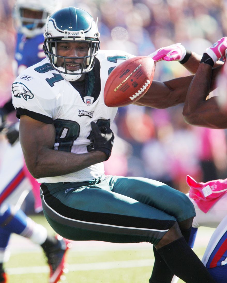 Philadelphia wide receiver Jason Avant fumbles during the third quarter against Buffalo on Sunday. The Eagles, who face the Redskins this week, turned the ball over five times in losing their fourth straight game. (Associated Press)