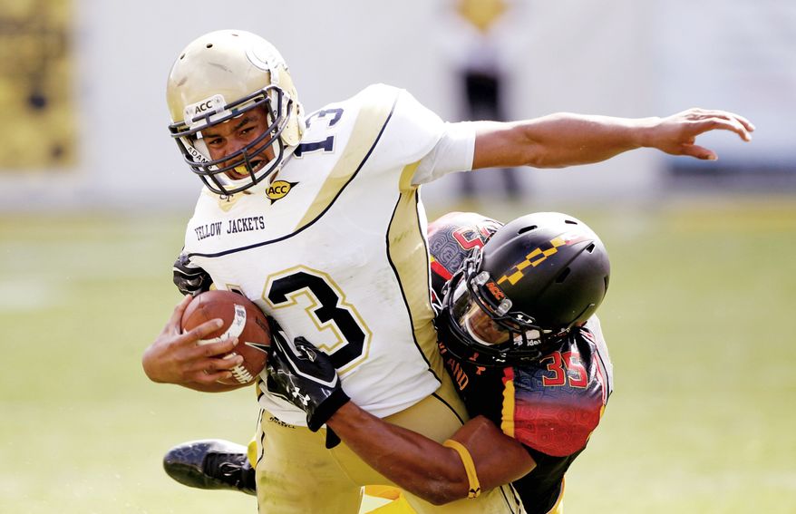 Maryland linebacker Alex Twine made two stops on Tevin Washington after the Georgia Tech quarterback ran past him for a touchdown earlier in the Yellow Jackets' 21-16 win last Saturday. (Associated Press)