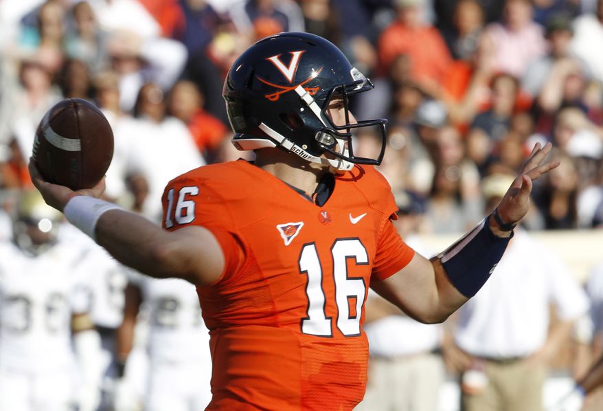 Virginia sophomore quarterback Michael Rocco has thrown for 1,150 yards on the year, but has eight interceptions and passed for only three touchdowns. (AP Photo/Steve Helber)
