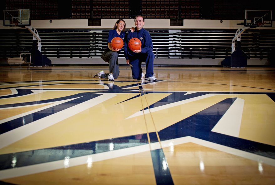 For George Washington coach Mike Lonergan and his wife, Maggie, "courtship" means sharing their views on basketball. Lonergan is beginning his first season at GW after six seasons at Vermont. (Rod Lamkey Jr./The Washington Times)
