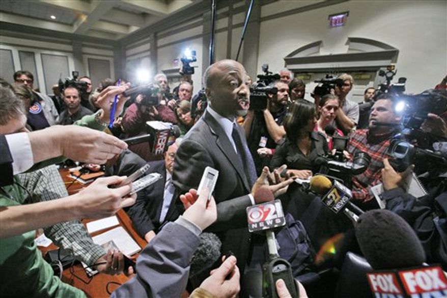 Penn State University Board of Trustees member Kenneth C. Frazier, President of Merck & Co., is surrounded by media after being appointed by the trustees to chair a special committee to investigate the alleged child abuse on campus, in State College, Pa., Friday, Nov. 11, 2011. The Penn State University Board of Trustees who fired legendary football coach Joe Paterno and school president Graham Spanier are meeting in the wake of the massive shakeup prompted by a child sex-abuse scandal.(AP Photo/Gene J. Puskar)