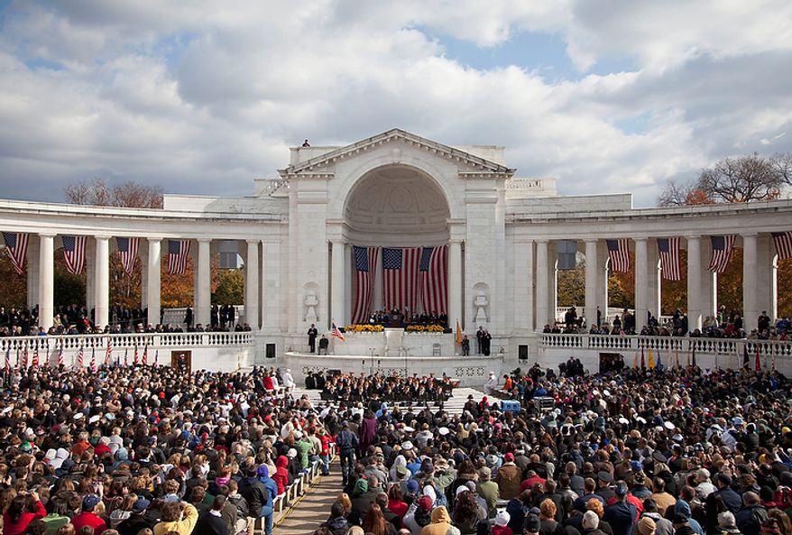 President Barack Obama speaks during a Veterans Day ceremony at Arlington National Cemetery in Arlington, Va., Friday, Nov. 11, 2011. (AP Photo/Evan Vucci)