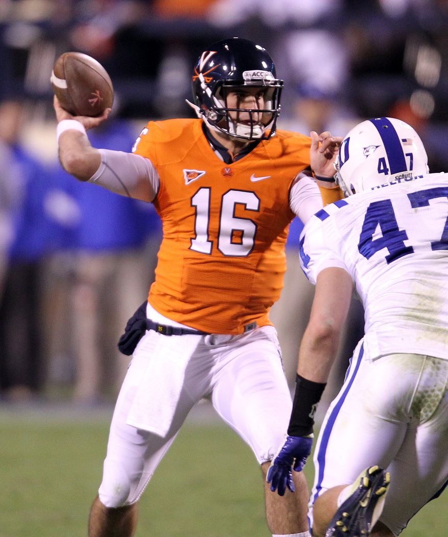 Virginia quarterback Michael Rocco threw for two touchdowns and 191 yards in Virginia's 31-21 win over Duke on Saturday night. (AP Photo/Andrew Shurtleff)