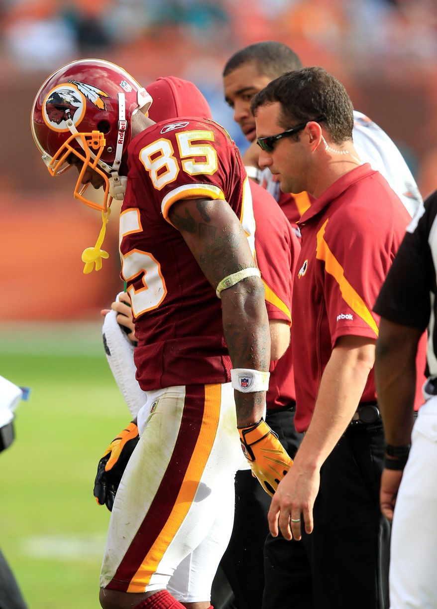 Leonard Hankerson was the first Redskins rookie with more than 100 receiving yards in a game in 10 years before leaving with an aching hip iin the fourth quarter. (Associated Press)
