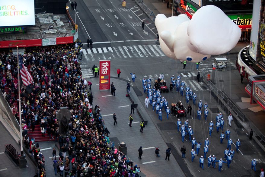 The 'Pillsbury Doughboy' float is seen during the Macy's Thanksgiving Day Parade. (AP Photo/Andrew Burton)